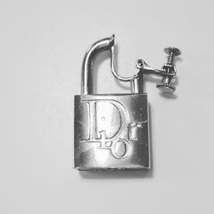 Christian Dior earring (left)